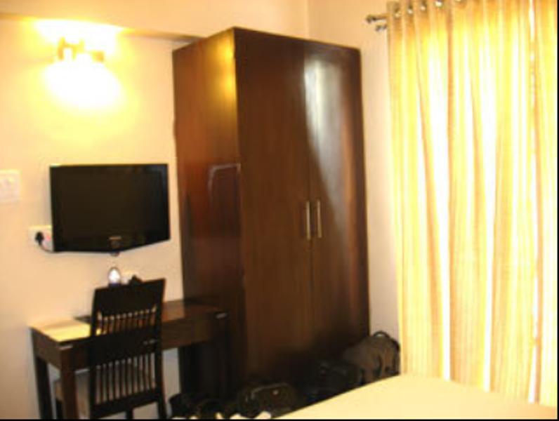 Hotel The Elite Suites Púna Szoba fotó